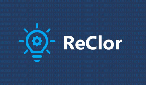 Graphic with the word ReClor in the center along side an icon of a lightbulb. Binary code makes up the backdrop of this graphic.