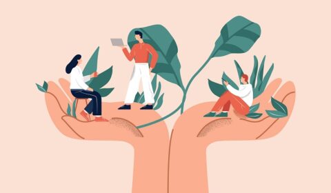 Huge hands holding tiny people office workers