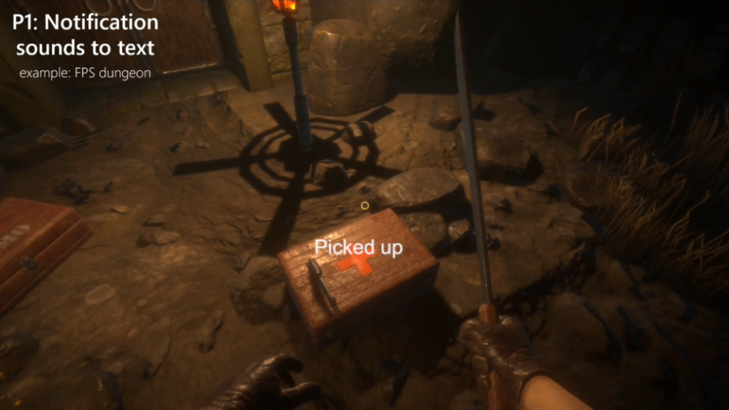 A first person view of a player picking up an item and the text "Picked up" being rendered.