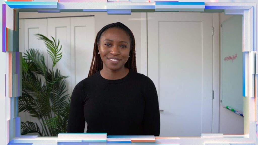 a person standing in front of a computer
