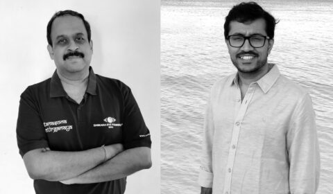 a couple of people posing for the camera