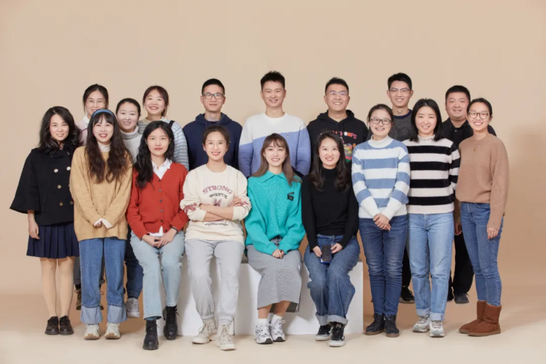 a group of people posing for a photo