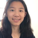 a woman smiling for the camera