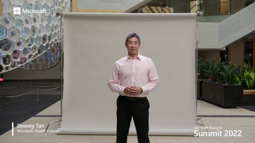 Desney Tan standing in a room