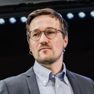 a man wearing a suit and tie