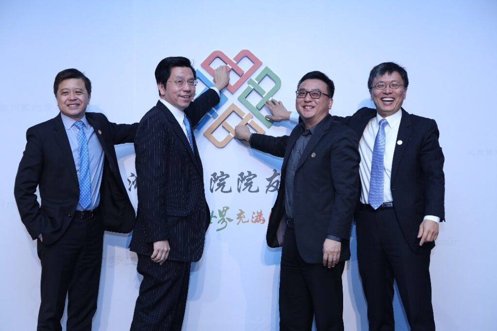 Hsiao-Wuen Hon, Kai-Fu Lee, Ya-Qin Zhang, Harry Shum posing for a photo