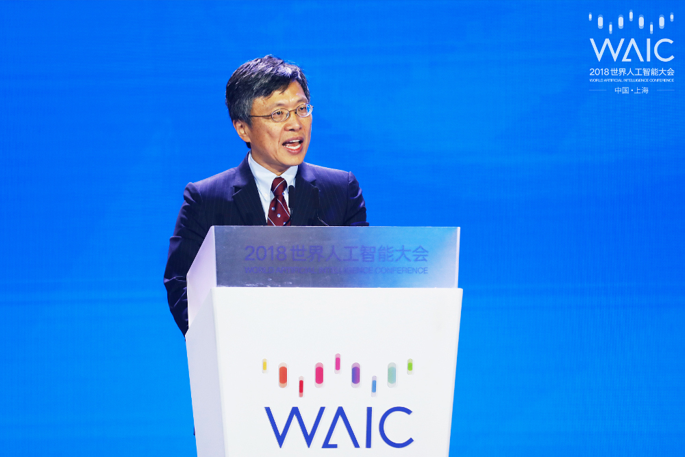 Harry Shum wearing a suit and tie