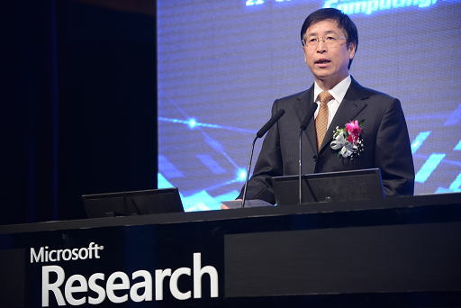 a screen shot of a man in a suit and tie