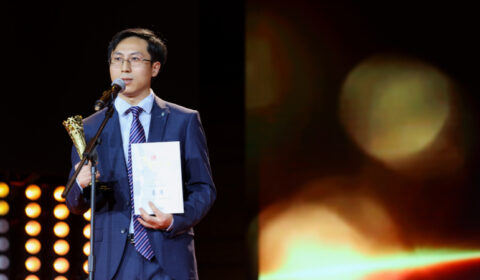 a man wearing a suit and tie