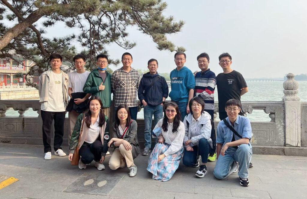 sitting on a bench posing for the camera