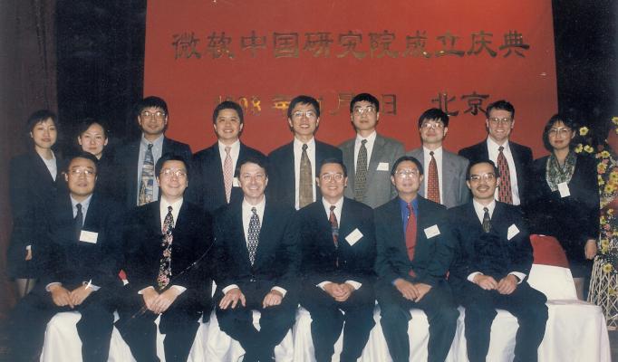 a group of people posing for the camera