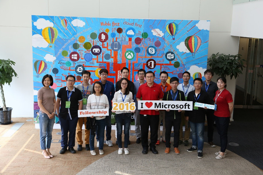 a group of people posing for a photo