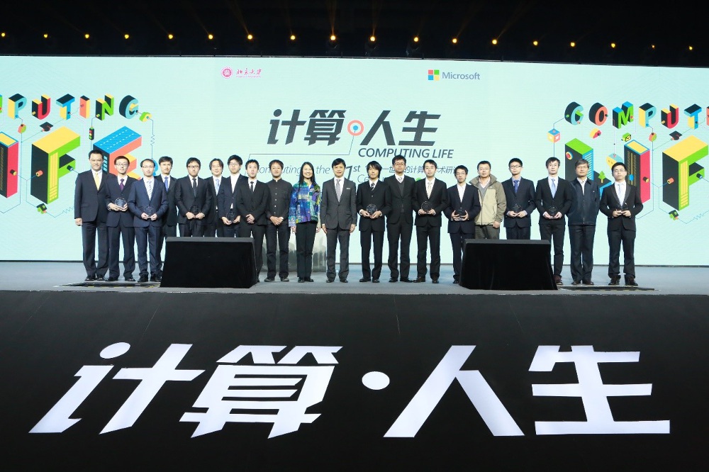 a group of people posing for a photo