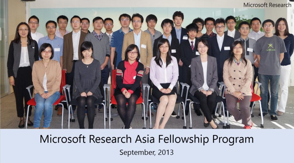 a group of people posing for a photo