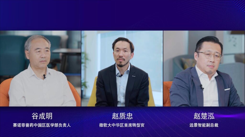 a group of people standing in front of a screen