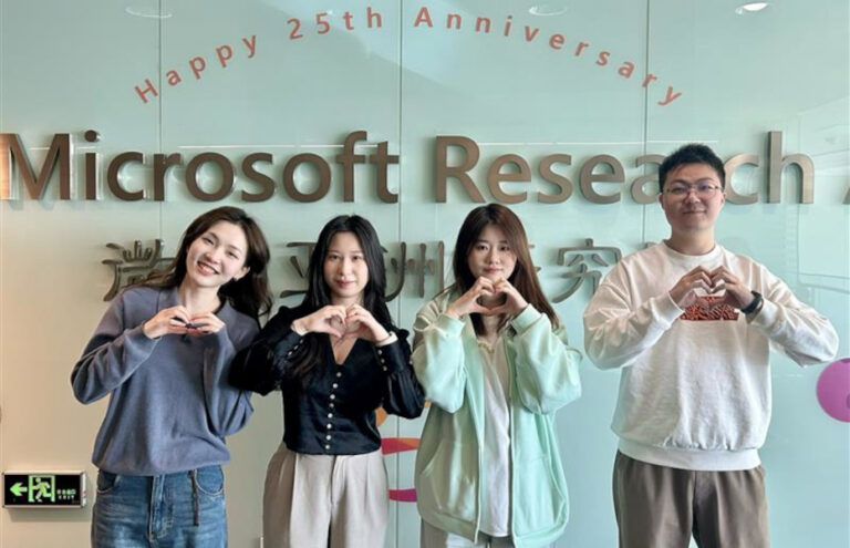 Women's Day 2024 | photo of three women and one man posing for the camera