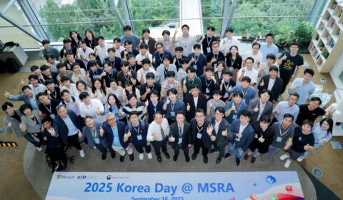 a group of people posing for a photo