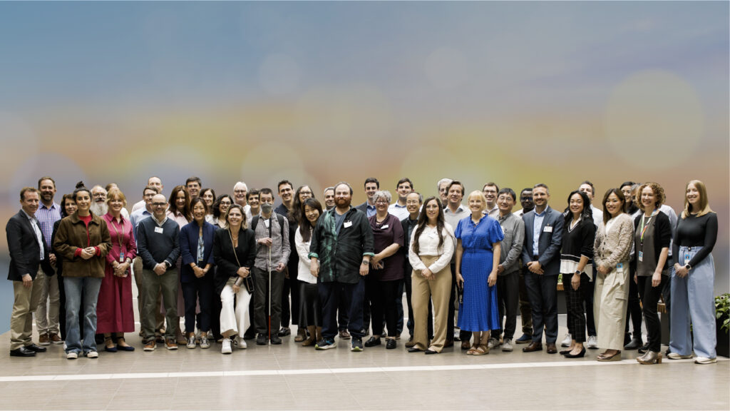 a group of people posing for a photo