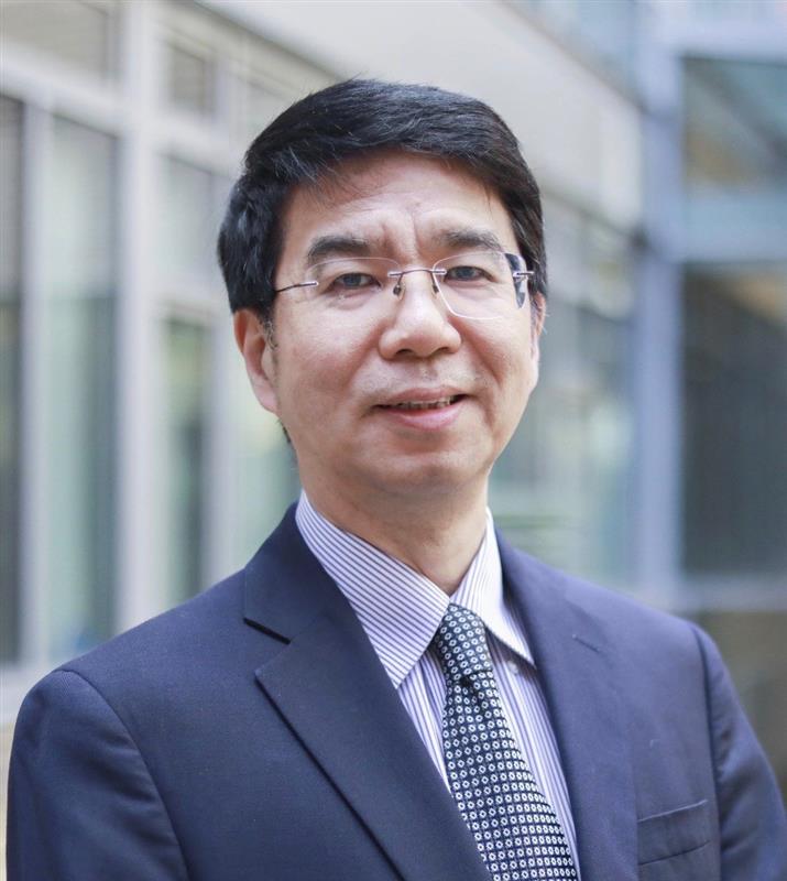 Jason Cong wearing a suit and tie