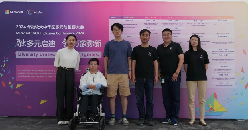 a group of people posing for a photo