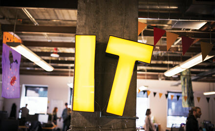 Image of a sign which reads IT.