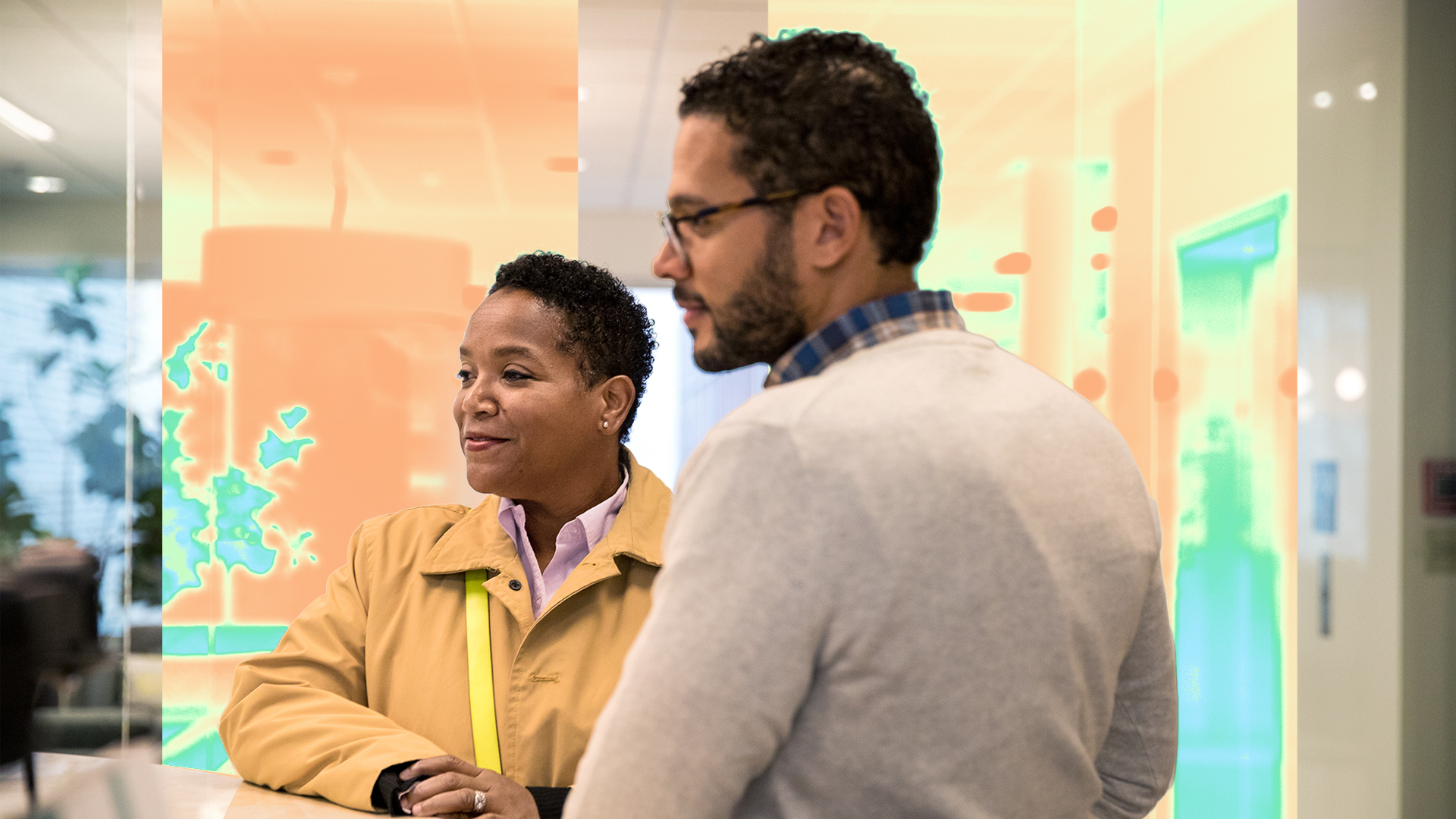 A man and woman looking at each other