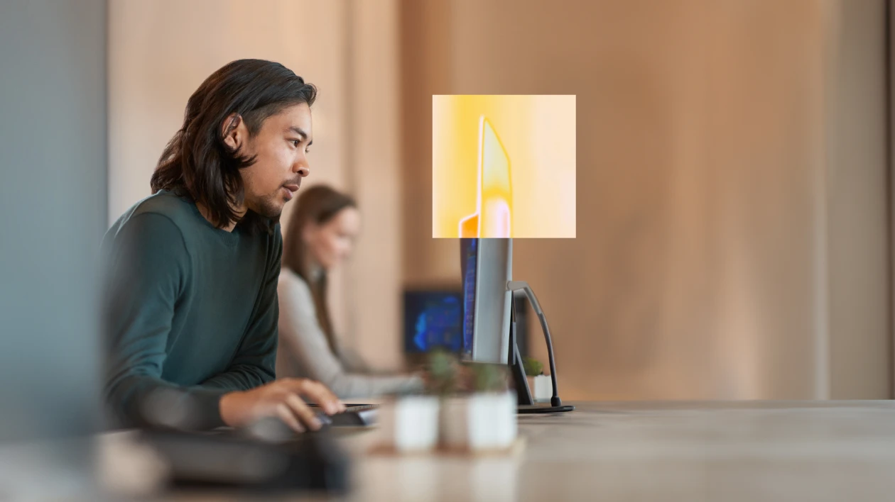A man sitting at a computer.
