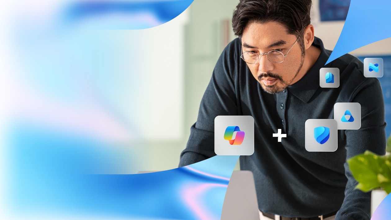 A person leaning over a desk, surrounded by floating icons of Microsoft Loop and Microsoft Defender, with abstract blue and white swirls in the background, suggesting collaboration between these tools.