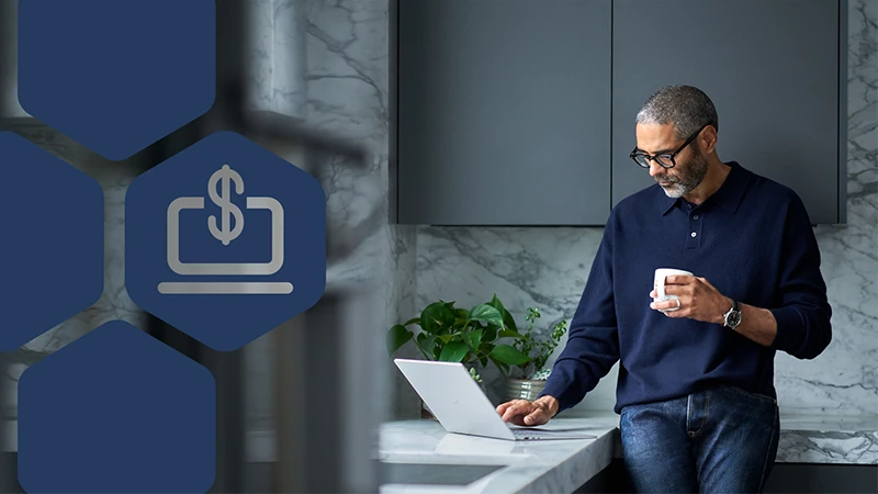 Image of a man on a laptop with the icon for financially motivated threats in overlay