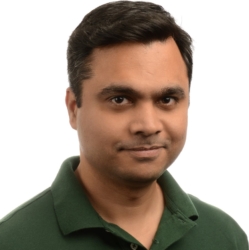 a man smiling for the camera