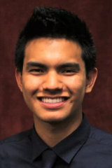 a man smiling for the camera