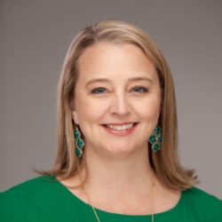 a woman smiling for the camera