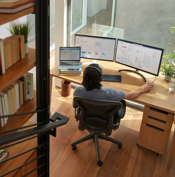 A developer working from home on a computer