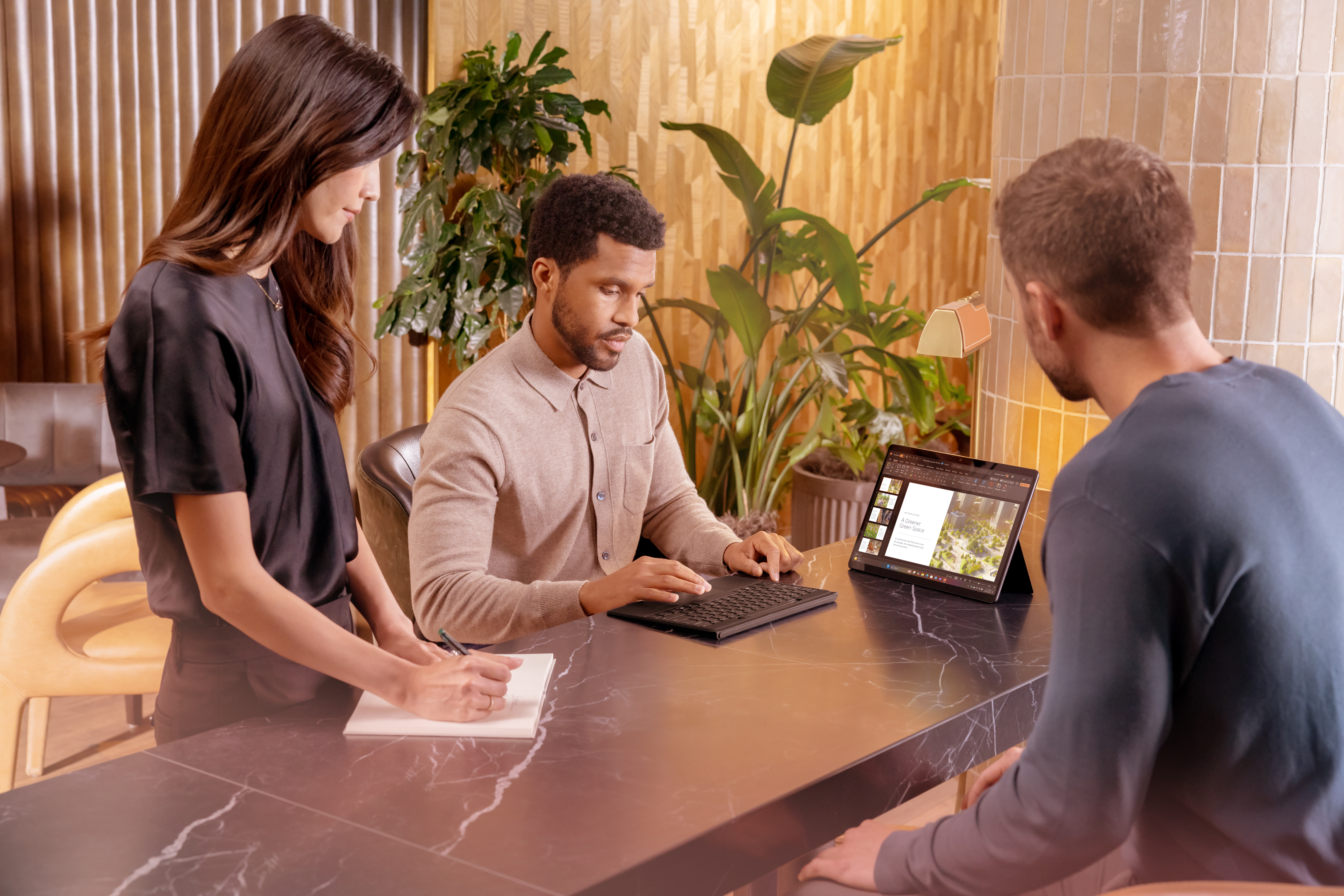 Students with laptop.