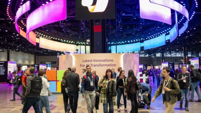 Group of people walking through event center