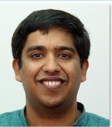 a man smiling for the camera