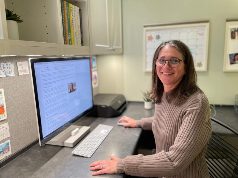Klinghoffer smiles as she looks over from her home office desk.