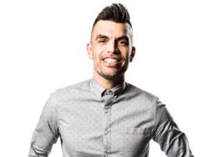 Weston smiles in a portrait photo.