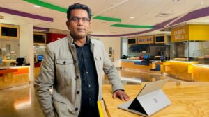 Selvaraj poses for a portrait in a Microsoft building.