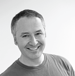 A headshot of Marzynski in black and white.