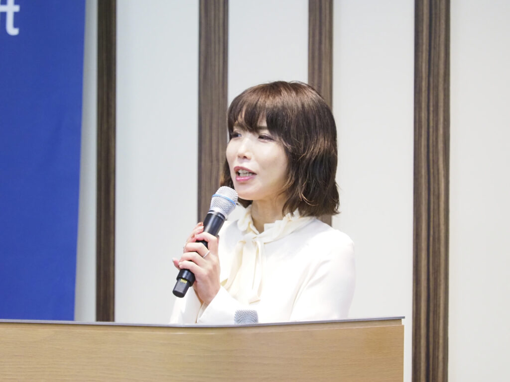 a person speaking into a microphone