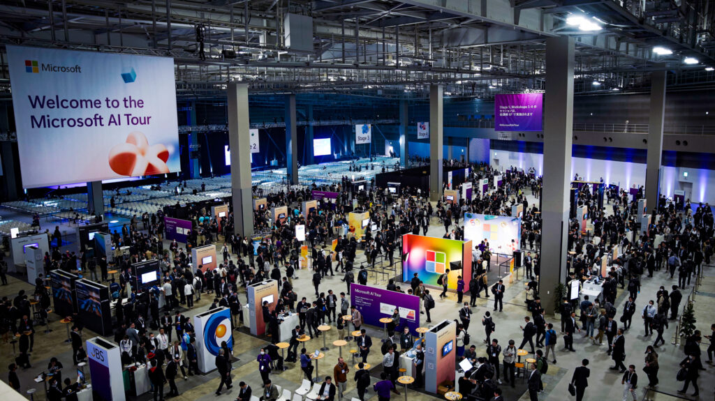A large group of people in a large room