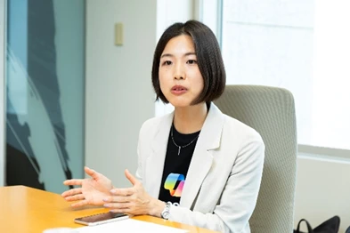 A woman sitting at a desk